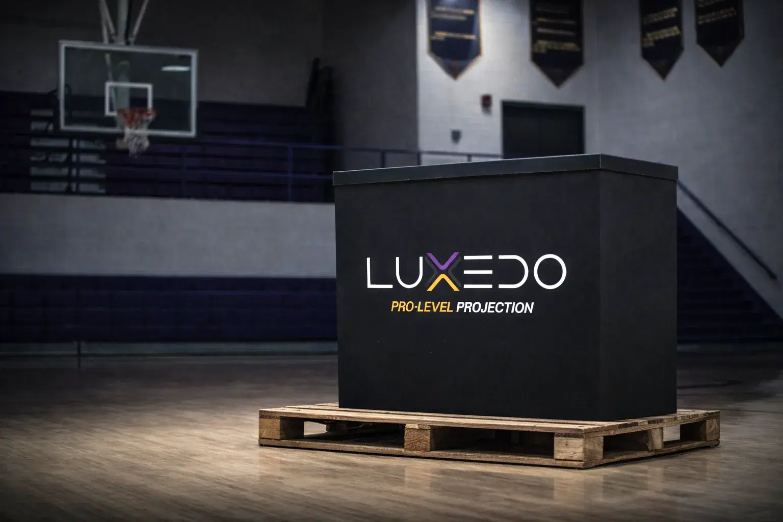 Luxedo court projection system arriving on-site at a school gym